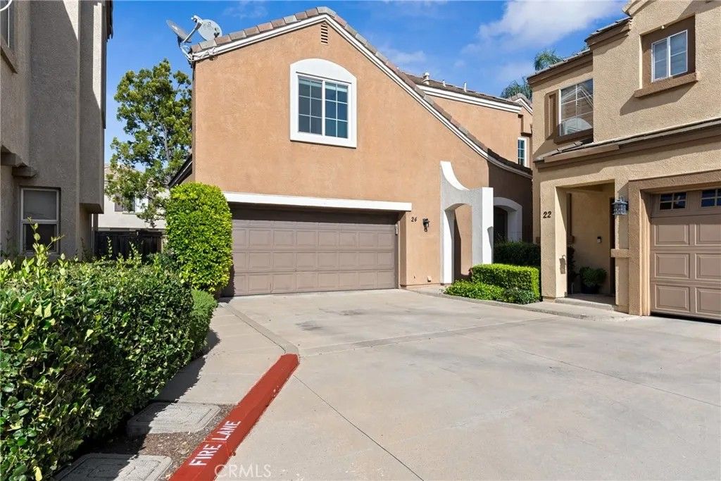 Photo of 24 Rue De Nicole, Lake Forest, CA 92610 (MLS # OC26055666)