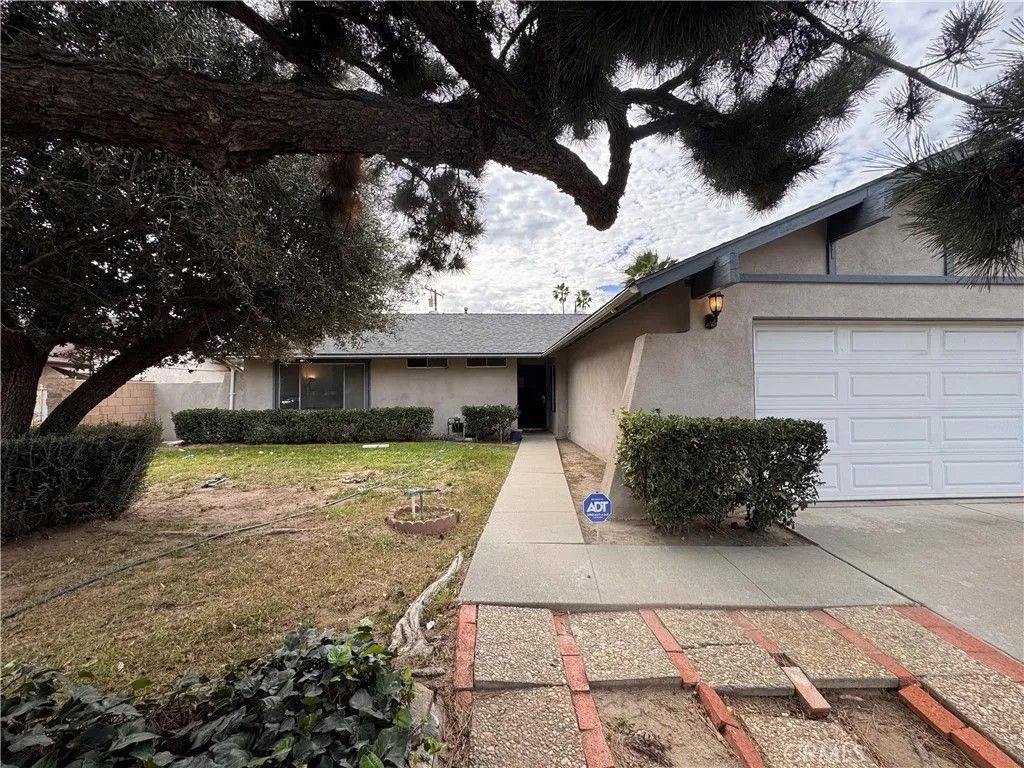 Photo of 1469 W Marshall Boulevard, San Bernardino, CA 92405 (MLS # CV26029893)