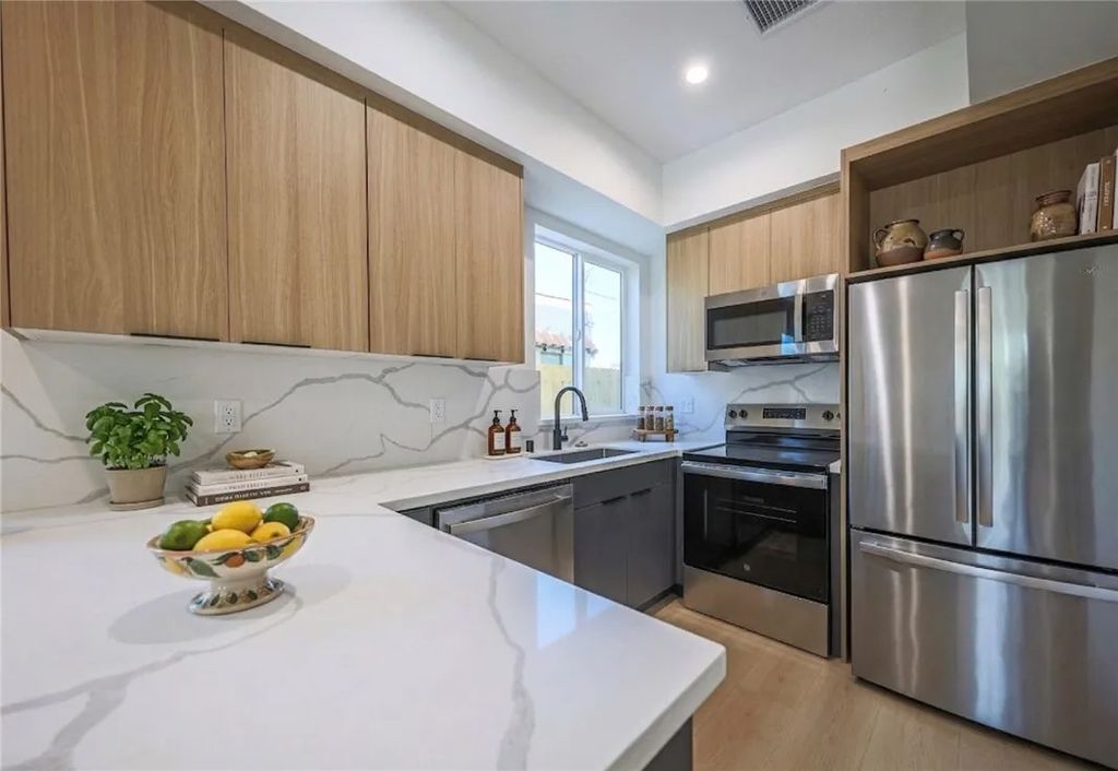 Photo of 2012 Dunsmuir Avenue #C, Los Angeles, CA 90016 (MLS # BB26074001)