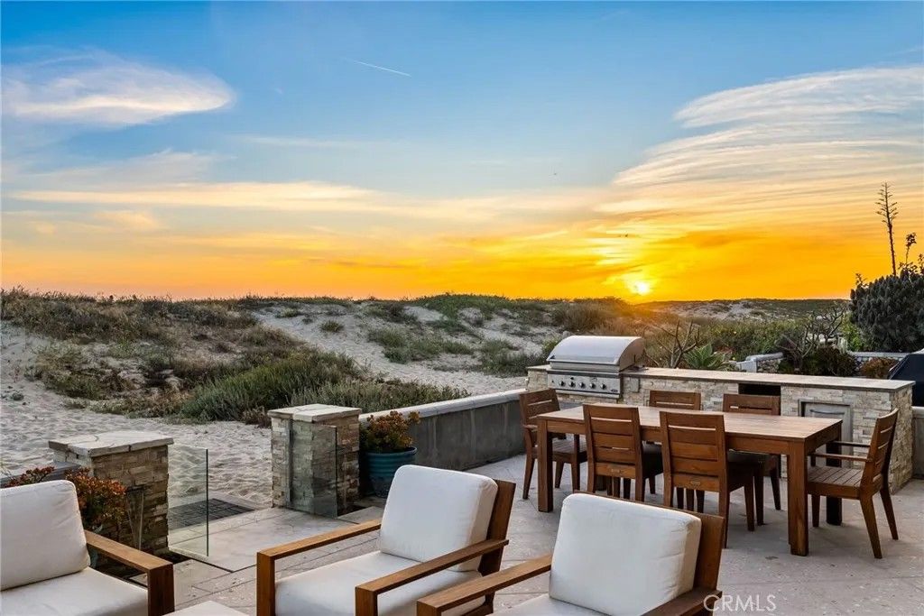 Photo of 7304 W Oceanfront, Newport Beach, CA 92663 (MLS # OC26088251)