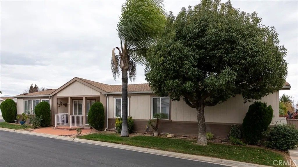 Photo of 10961 Desert Lawn Dr #243, Calimesa, CA 92320 (MLS # IG26005139)