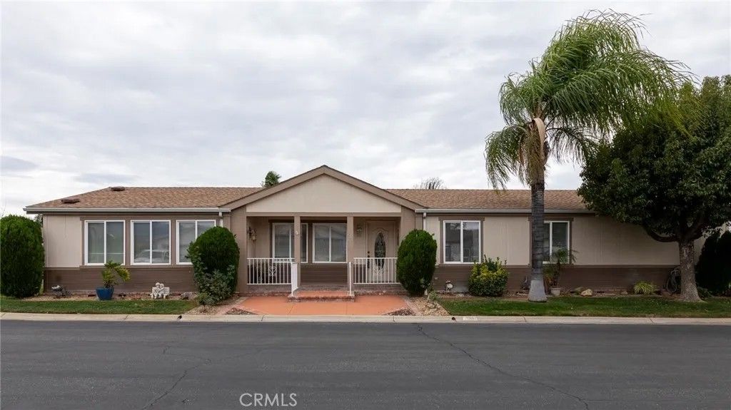 Photo of 10961 Desert Lawn Dr #243, Calimesa, CA 92320 (MLS # IG26005139)