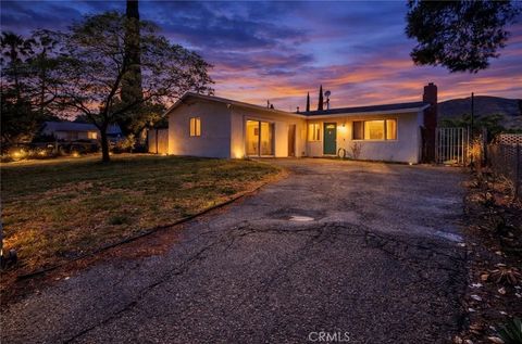 Photo of 521 E Repplier Rd, Banning, CA 92220 (MLS # IV26084663)