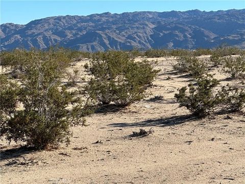Photo of 0 Nandia, 29 Palms, CA 92277 (MLS # JT25275588)