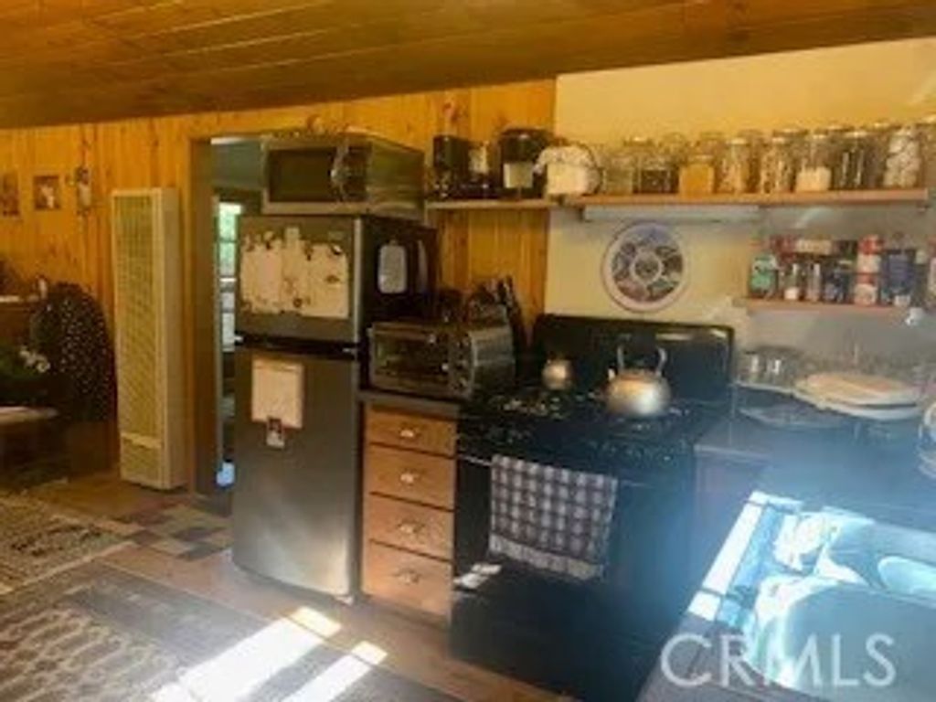 Photo of 402 Burnt Mill Canyon Road, Cedarpines Park, CA 92322 (MLS # CV26044710)