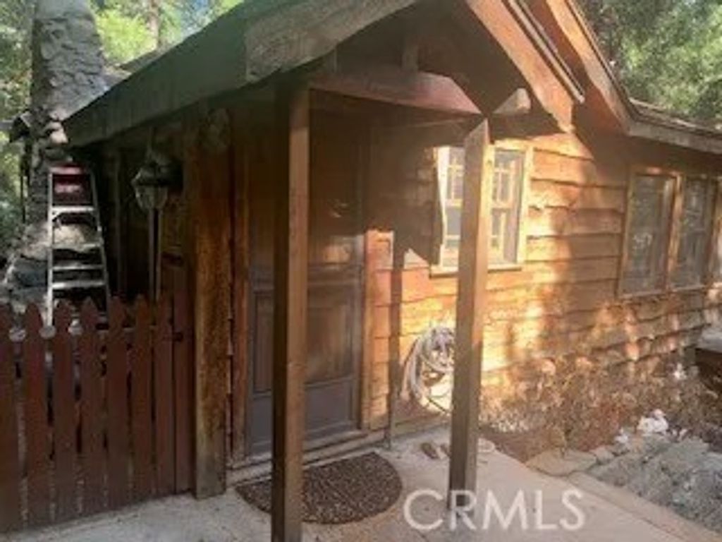 Photo of 402 Burnt Mill Canyon Road, Cedarpines Park, CA 92322 (MLS # CV26044710)