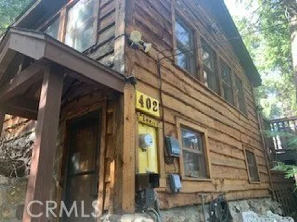 Photo of 402 Burnt Mill Canyon Road, Cedarpines Park, CA 92322 (MLS # CV26044710)