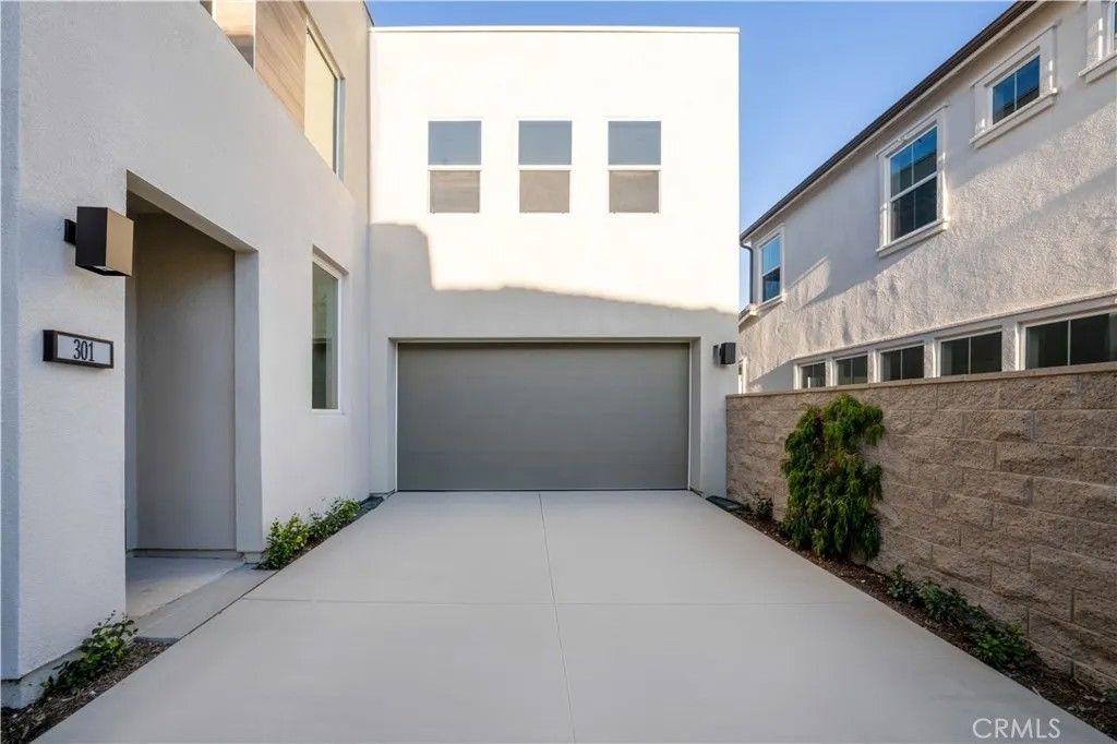 Photo of 301 Brackens, Lake Forest, CA 92630 (MLS # OC25270377)