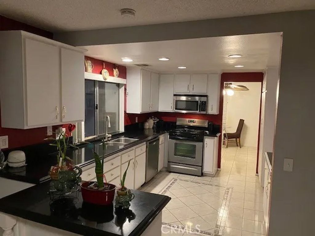 Photo of 1642 Bisbee Pl, Lancaster, CA 93535 (MLS # MB25276347)