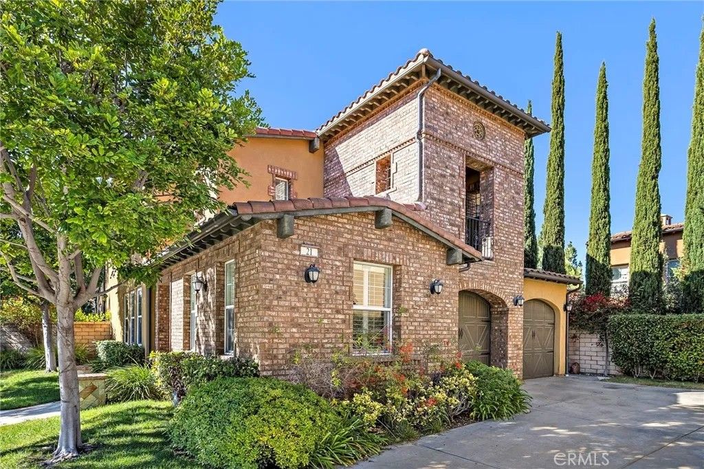 Photo of 21 Paperbark, Irvine, CA 92620 (MLS # OC25267206)