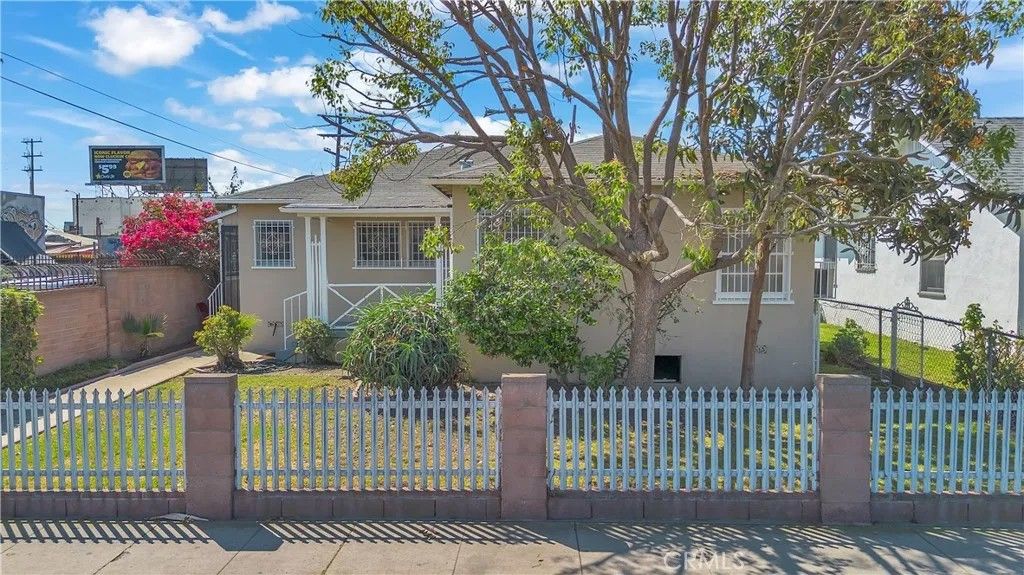 Photo of 1018 E 73rd St, Los Angeles, CA 90001 (MLS # DW26051665)