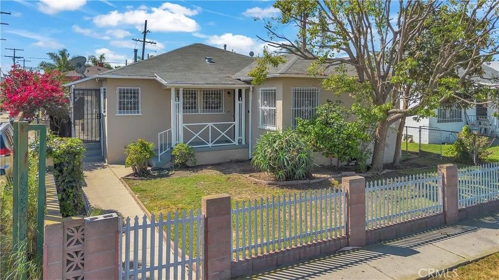 Photo of 1018 E 73rd St, Los Angeles, CA 90001 (MLS # DW26051665)