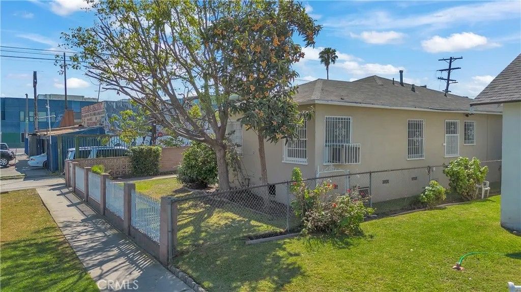 Photo of 1018 E 73rd St, Los Angeles, CA 90001 (MLS # DW26051665)