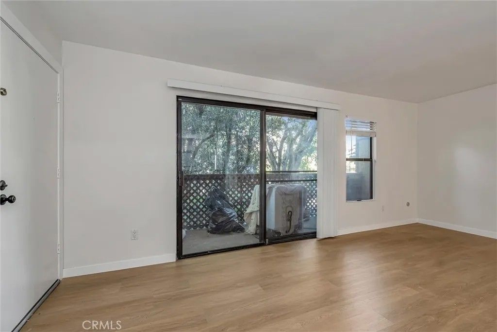 Photo of 7304 Corbin Avenue #J, Reseda, CA 91335 (MLS # SR26087908)