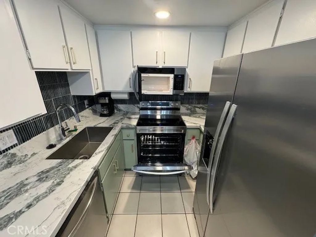 Photo of 3939 E Allin St #106, Long Beach, CA 90803 (MLS # OC26025559)