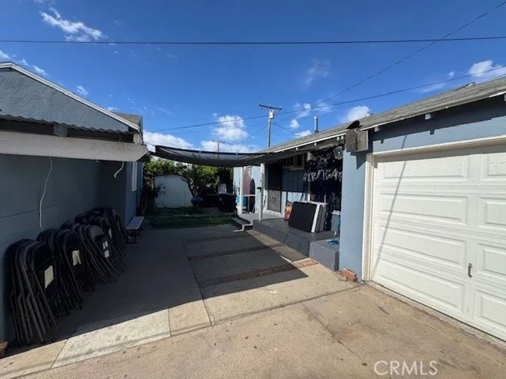 Photo of 4957 E 59th Place, Maywood, CA 90270 (MLS # AR26043385)