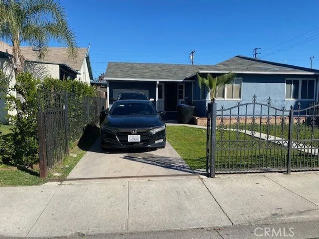 Photo of 4957 E 59th Place, Maywood, CA 90270 (MLS # AR26043385)