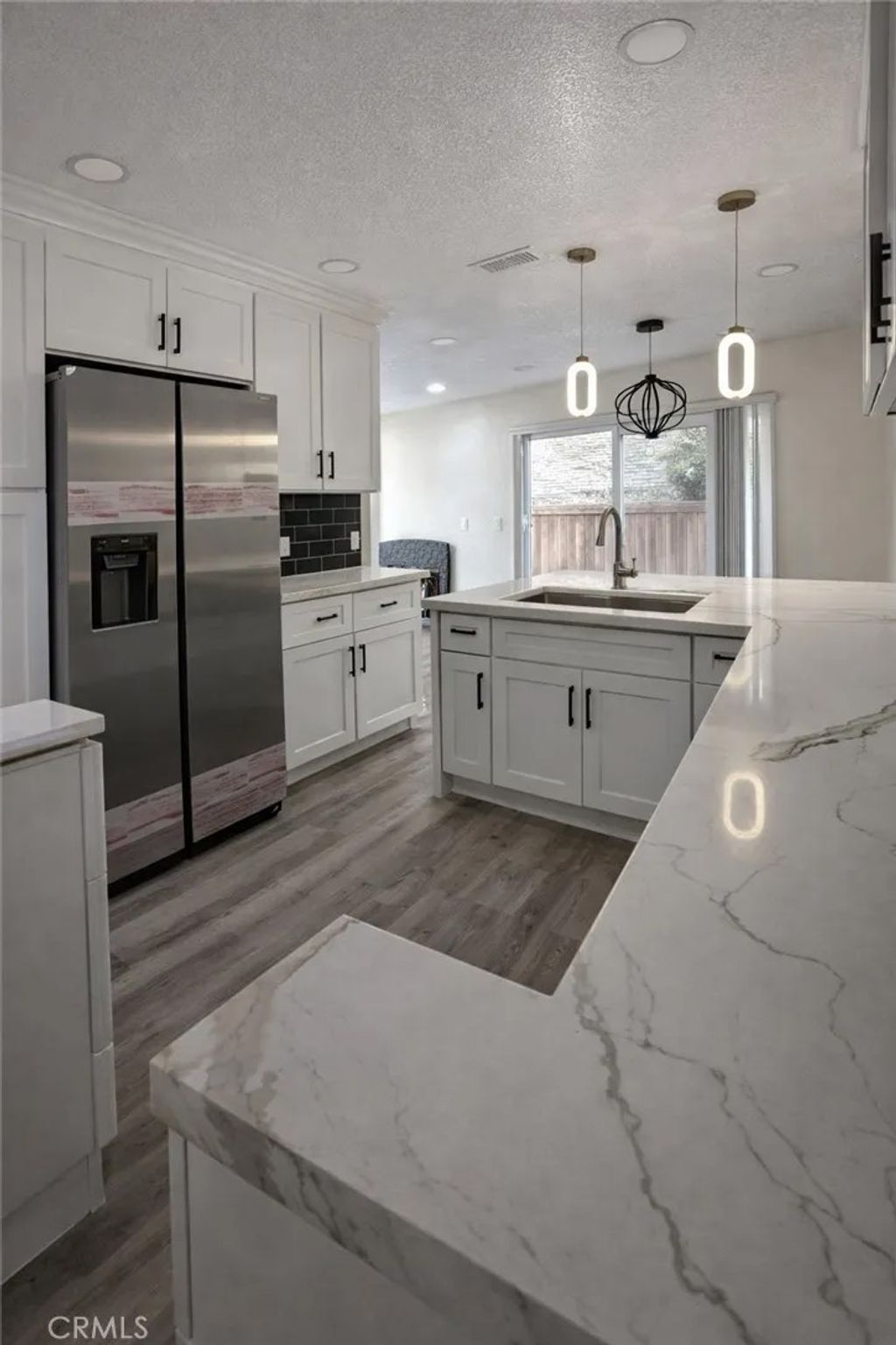 Photo of 3725 W Park Balboa Ave, Orange, CA 92868 (MLS # OC26018862)