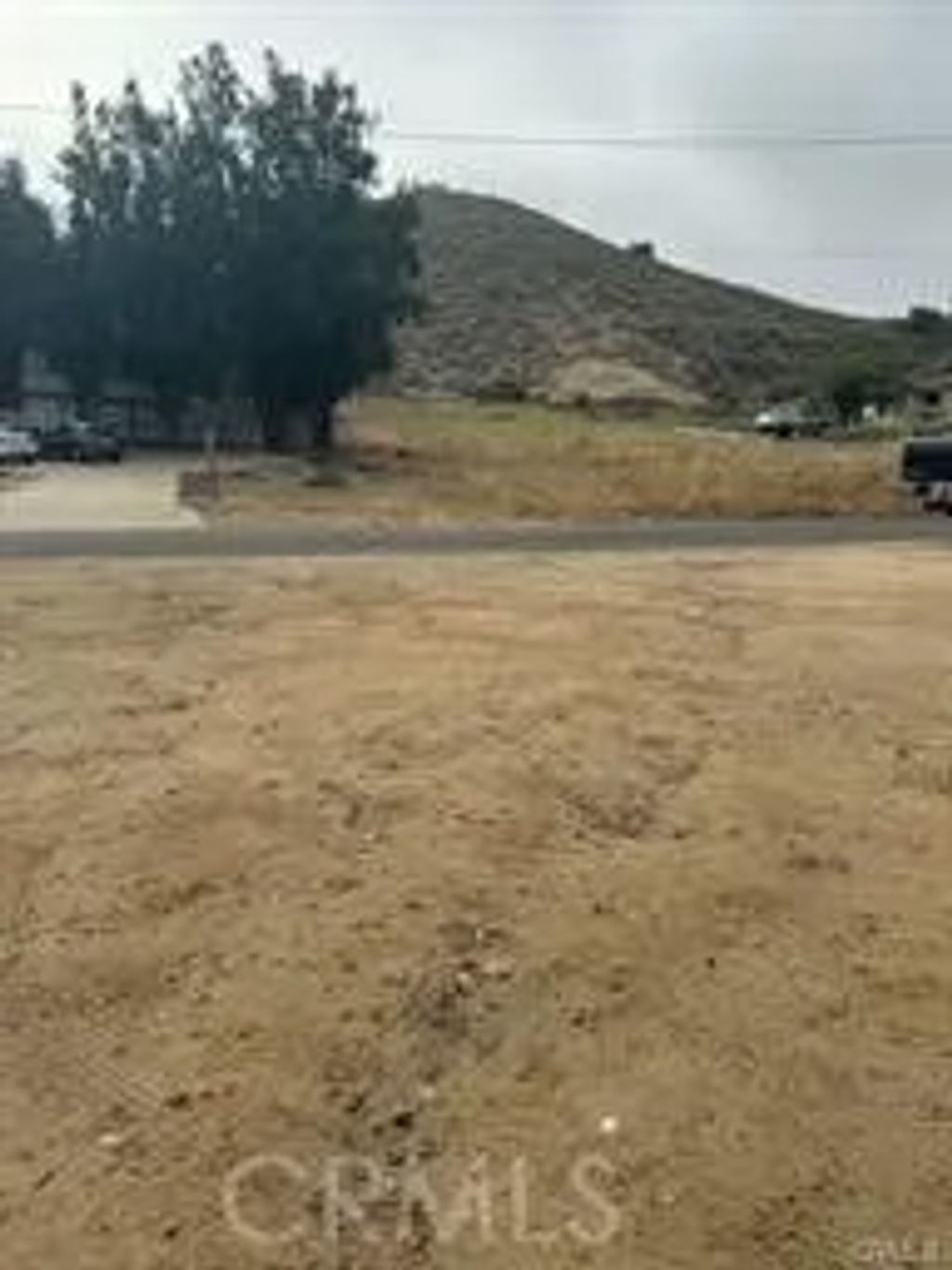 Photo of 0 Peck, Lake Elsinore, CA 92530 (MLS # SW25060709)