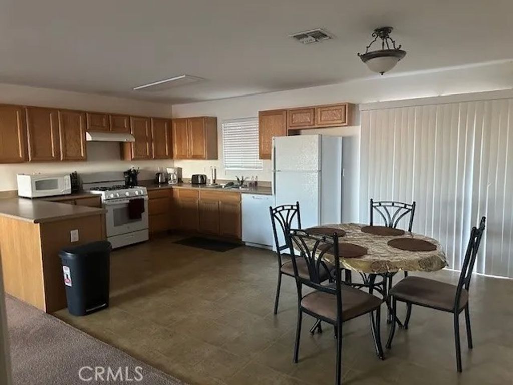 Photo of 73482 Desert Trail #2, 29 Palms, CA 92277 (MLS # SW25252283)