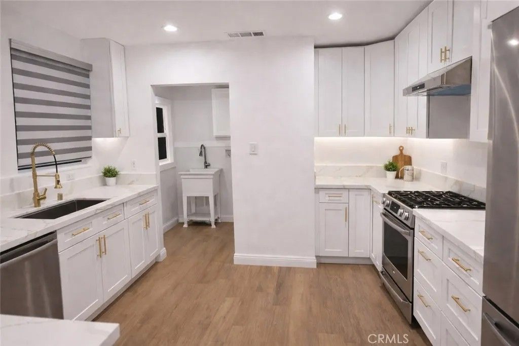 Photo of 1726 W 52nd St, Los Angeles, CA 90062 (MLS # PW26072499)