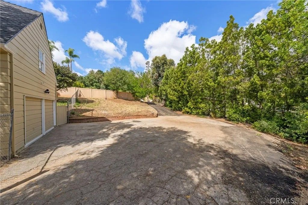 Photo of 4874 Palo Drive, Tarzana, CA 91356 (MLS # SR26061353)