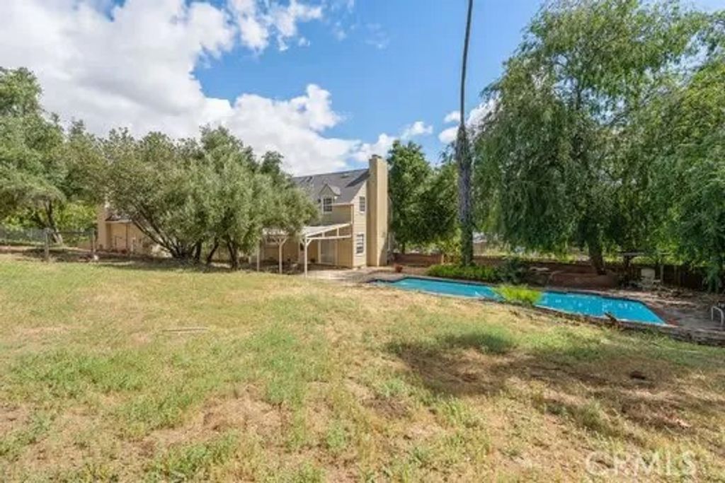 Photo of 4874 Palo Drive, Tarzana, CA 91356 (MLS # SR26061353)