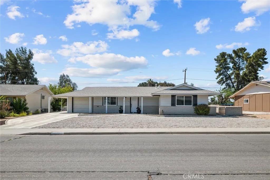 Photo of 26750 Oakmont Dr, Menifee, CA 92586 (MLS # SW26114466)