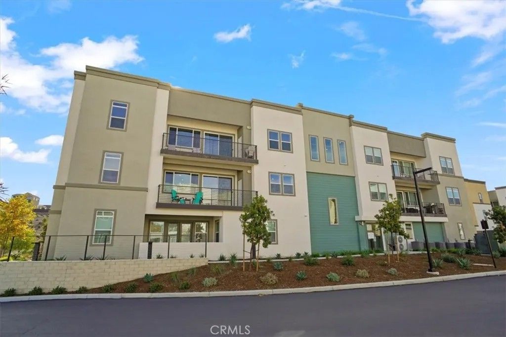 Photo of 27410 N Merlin Pl #205, Valencia, CA 91381 (MLS # SR26017263)