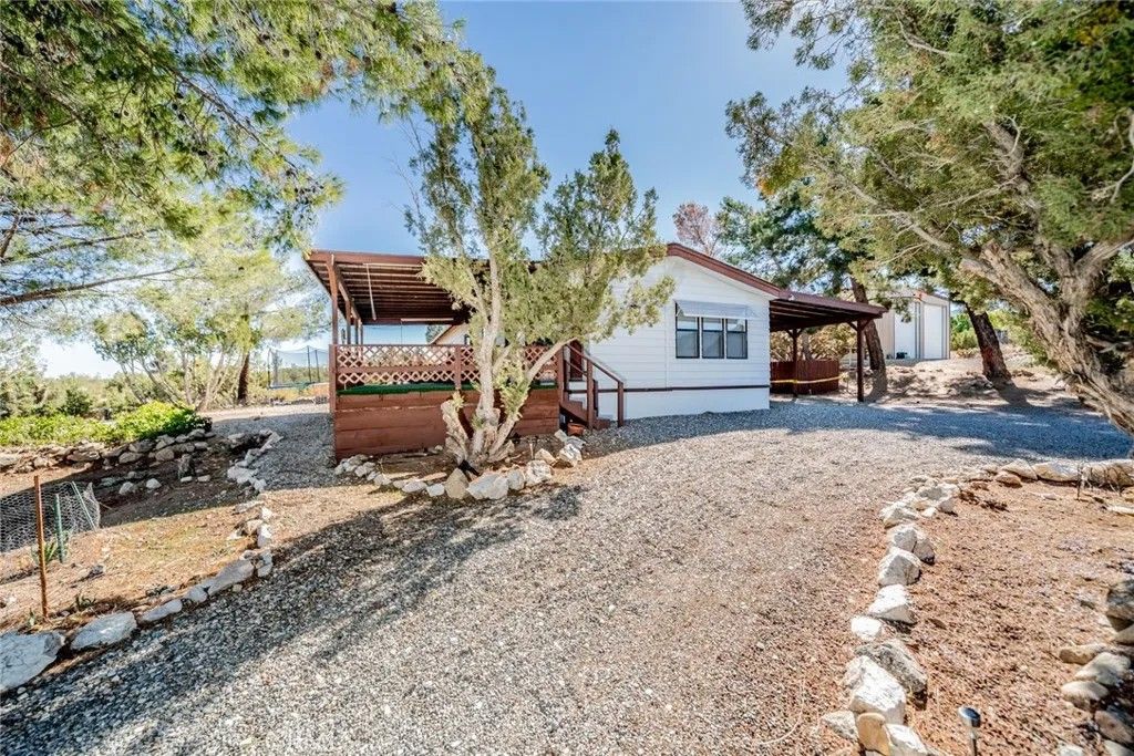 Photo of 9999 Oasis Road, Pinon Hills, CA 92372 (MLS # HD25248808)