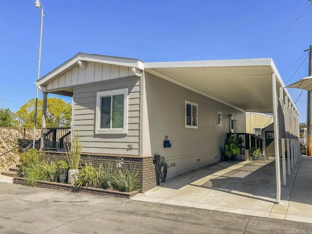 Photo of 8545 Mission Gorge Rd #Spc 211, Santee, CA 92071 (MLS # PTP2601745)