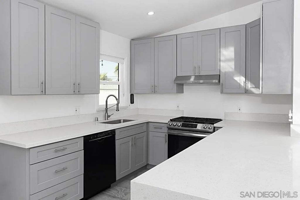 Photo of 3031 Murray Ridge Rd, San Diego, CA 92123 (MLS # 260006093)