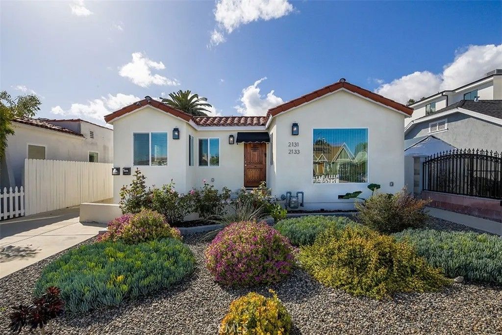 Photo of 2131 S Cloverdale Ave, Los Angeles, CA 90016 (MLS # DW26011304)