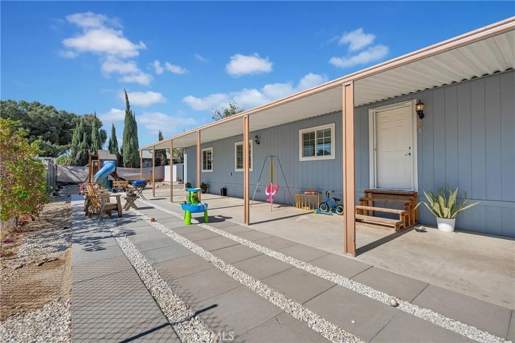 Photo of 30110 La Puerta DR, Homeland, CA 92548 (MLS # PW26154123)