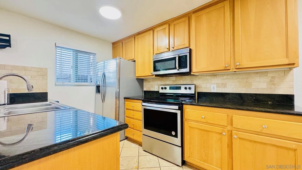 Photo of 9860 Dale Avenue #C12, Spring Valley, CA 91977 (MLS # 260003106)