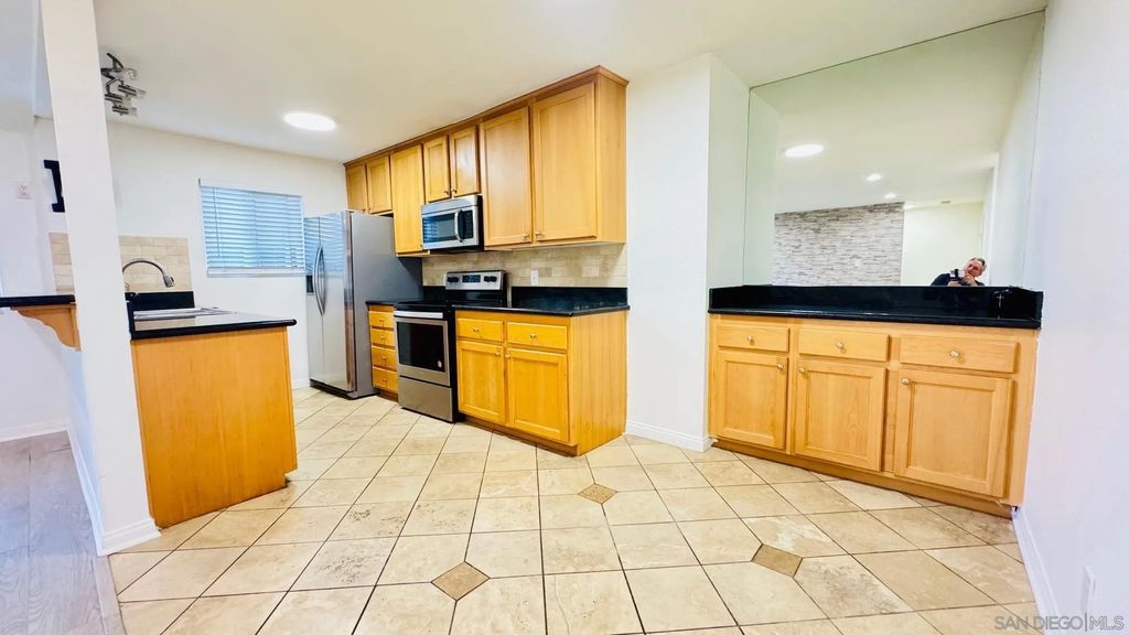 Photo of 9860 Dale Avenue #C12, Spring Valley, CA 91977 (MLS # 260003106)