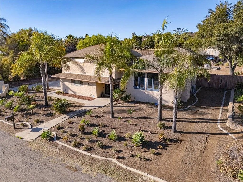 Photo of 3342 Silver Oak Lane, Vista, CA 92084 (MLS # SW25243086)