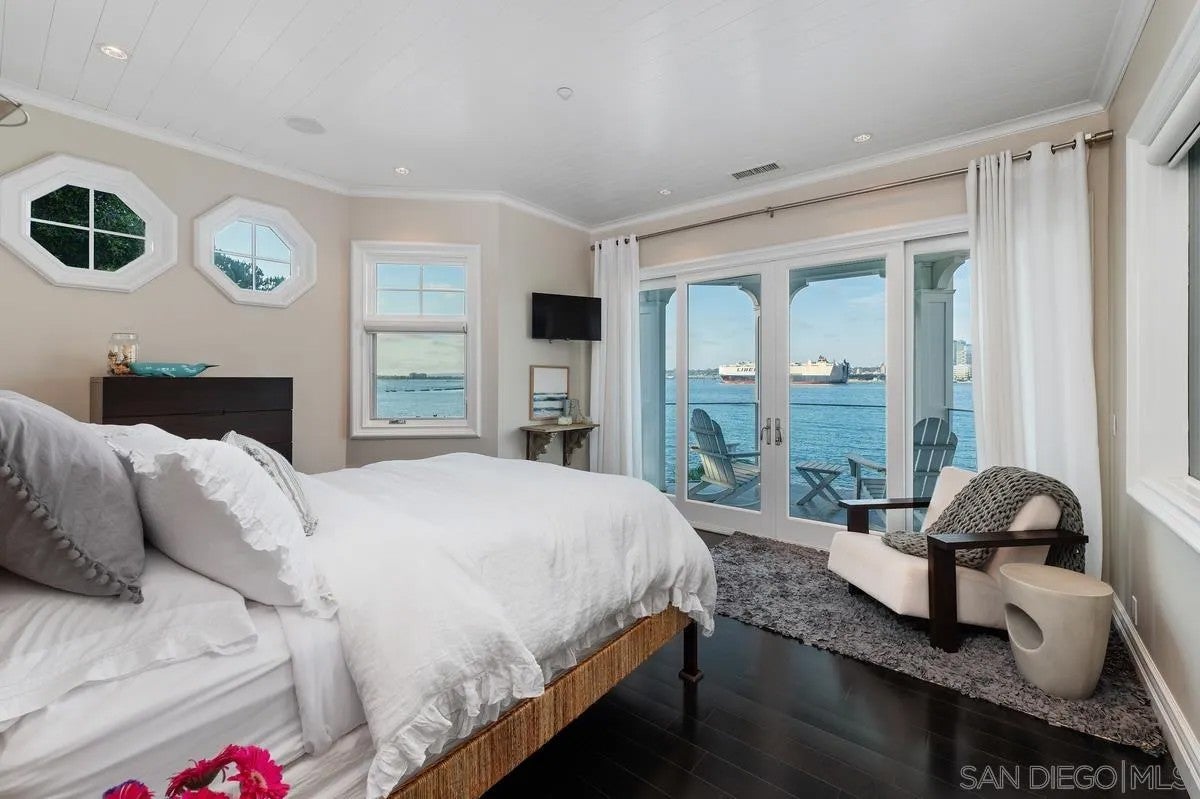Step through the custom glass front door, etched with the San Diego sk – image 40