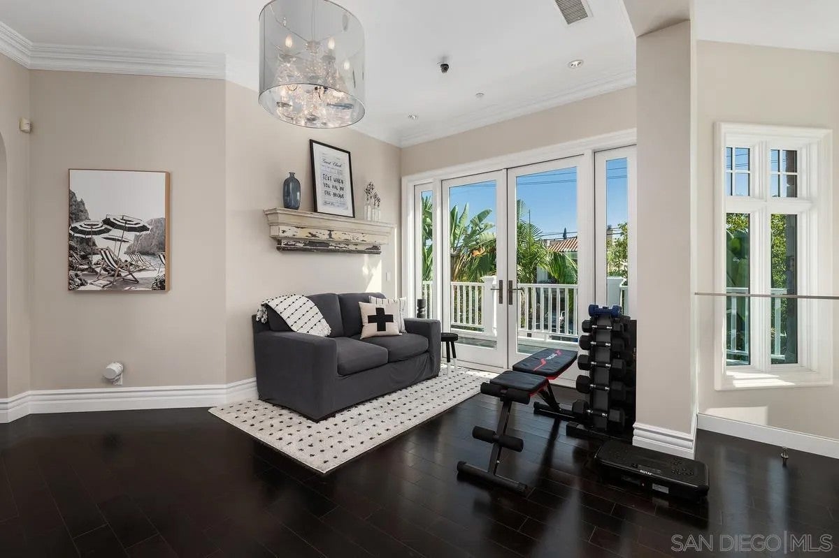 Step through the custom glass front door, etched with the San Diego sk – image 44