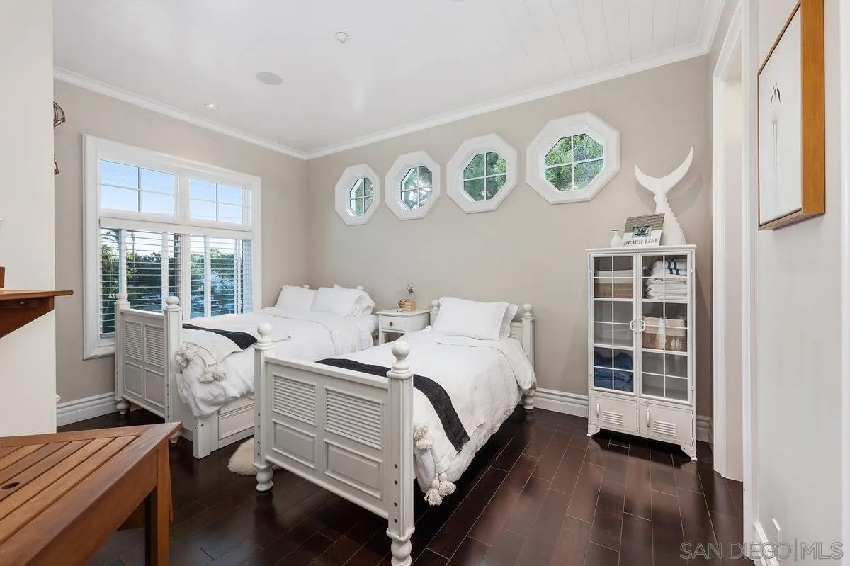 Step through the custom glass front door, etched with the San Diego sk – image 43