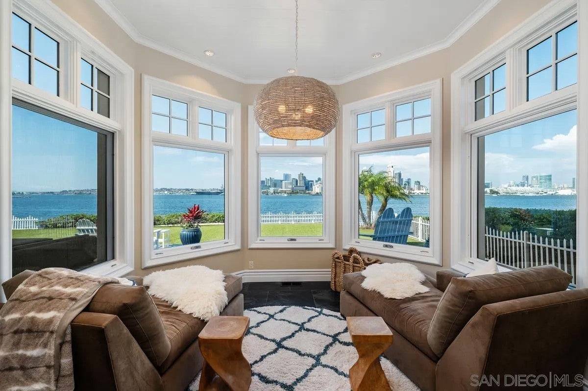 Step through the custom glass front door, etched with the San Diego sk – image 21