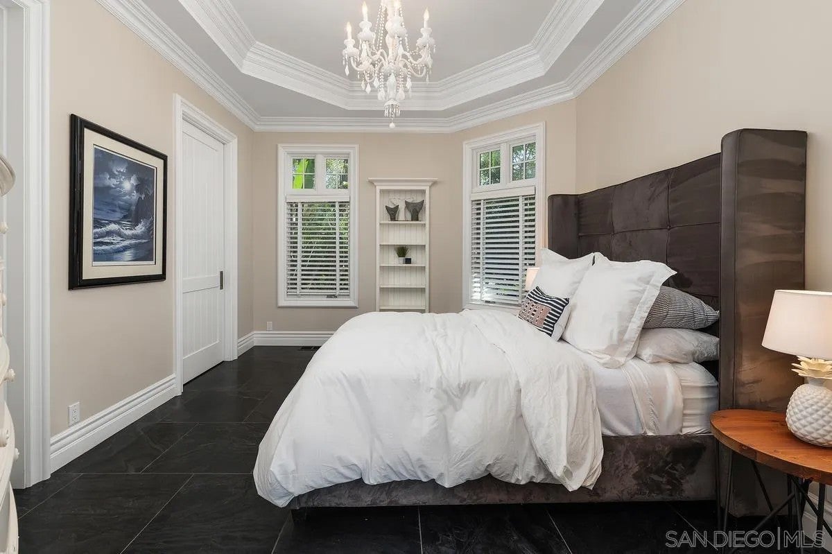 Step through the custom glass front door, etched with the San Diego sk – image 22