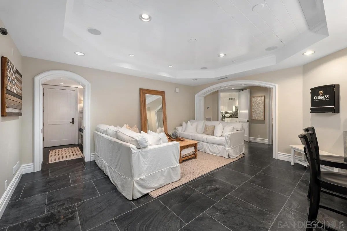 Step through the custom glass front door, etched with the San Diego sk – image 45