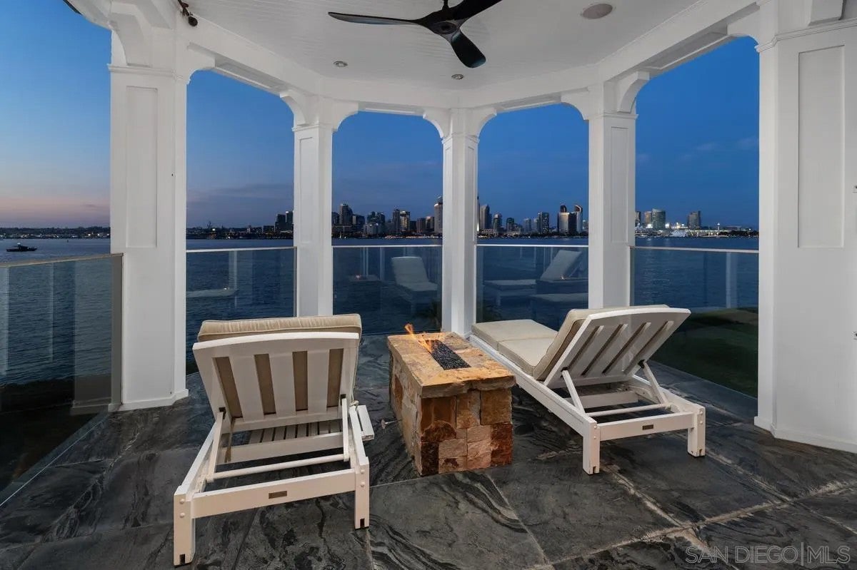 Step through the custom glass front door, etched with the San Diego sk – image 37