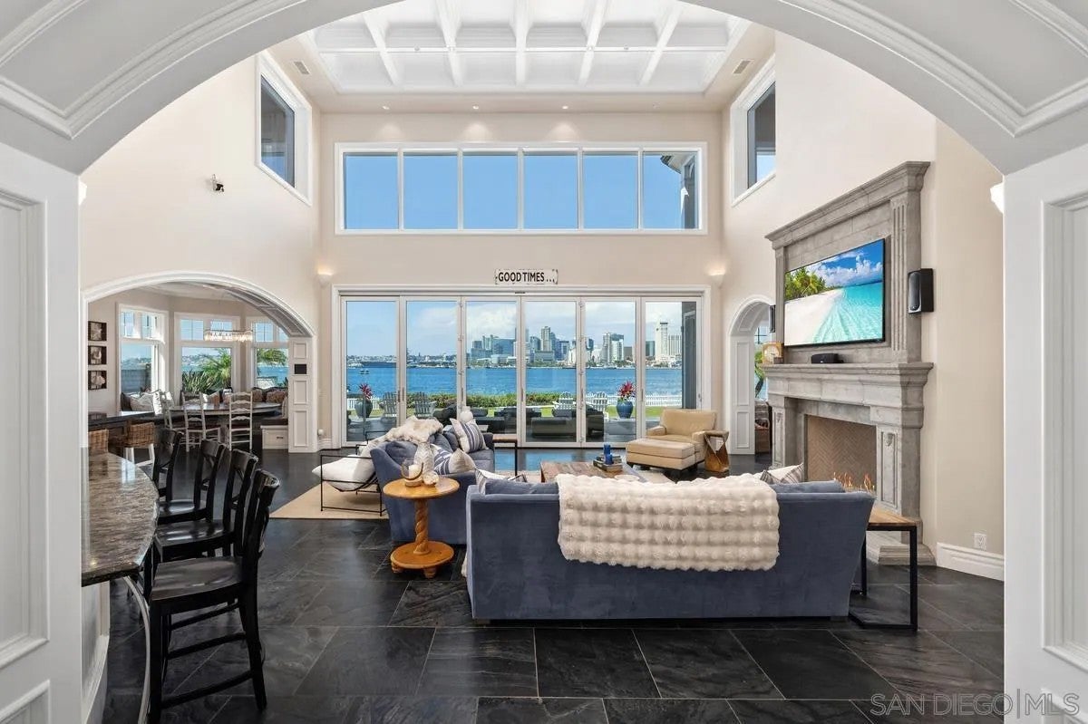 Step through the custom glass front door, etched with the San Diego sk – image 8