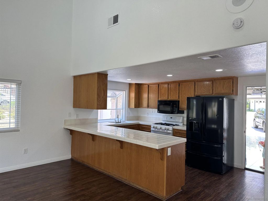 Photo of 11732 Calle Trucksess, El Cajon, CA 92019 (MLS # 260010832)