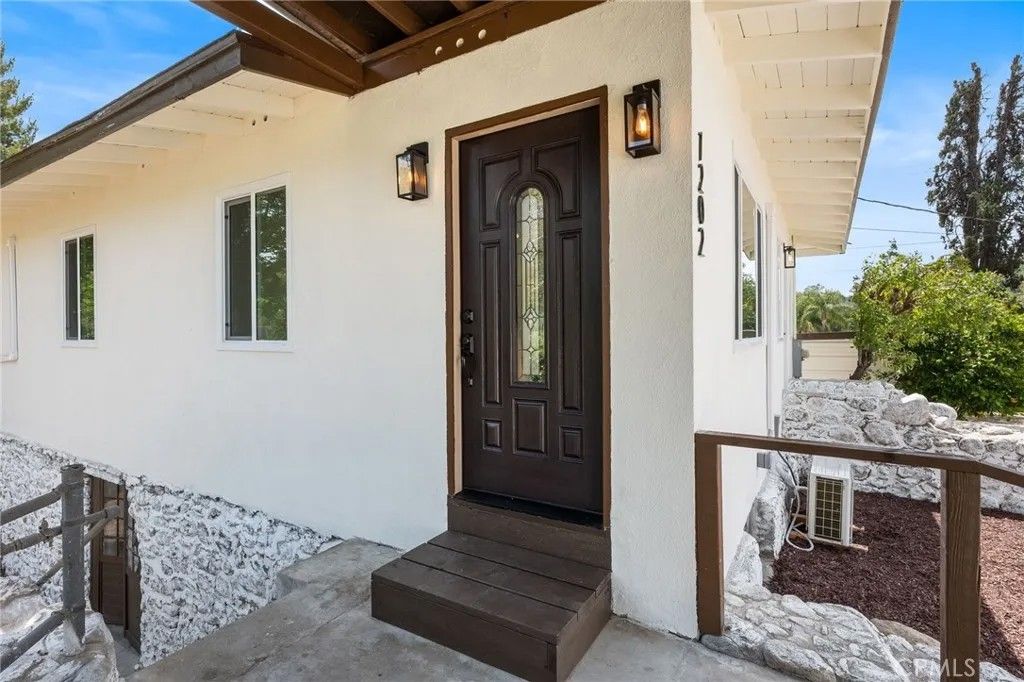 Photo of 1202 Amethyst Street, Mentone, CA 92359 (MLS # IV26098056)
