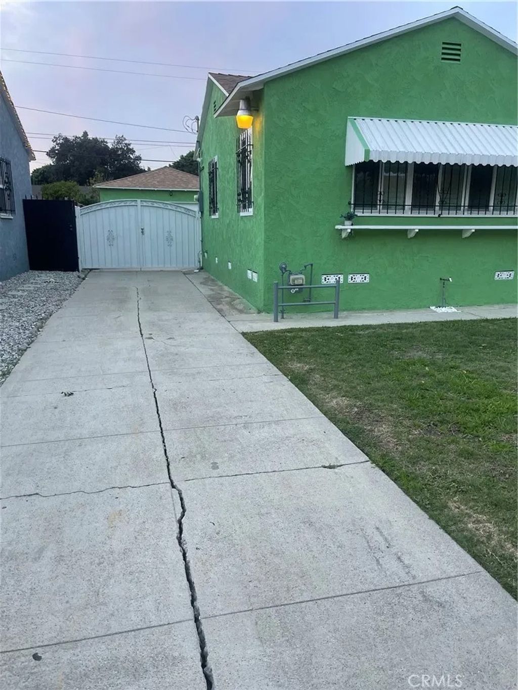 Photo of 12119 Alvaro St, Los Angeles, CA 90059 (MLS # TR25270094)