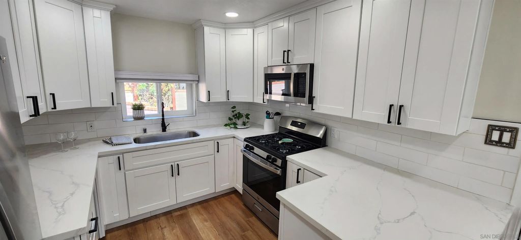 Photo of 8587 Alpine Ave, La Mesa, CA 91941 (MLS # 250040328)