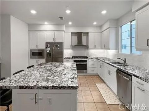 Photo of 125 Cadence, Irvine, CA 92618 (MLS # OC26104520)